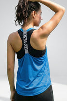 Back view of SVL Yasmine T-shirt in blue designed for padel and tennis players