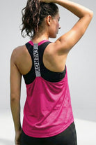 Back view of SVL Yasmine T-shirt in pink performance fabric for padel and tennis wear